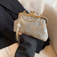 Nouveau sac en soie texturée de style chinois pour femme, élégant et atmosphérique, sac à main haut de gamme pour le quotidien
