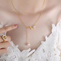 Offre Spéciale blanc coquille de mer fleur forme tulipe fausse perle gland collier titane acier