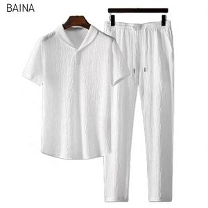 เสื้อแขนสั้นฤดูร้อน + กางเกงขายาว ปกเสื้อแบบปกเชิ้ต กระดุมผูกเอวแบบยางยืด ชุดวอร์มผู้ชาย 2 ชิ้น - Product Image 1