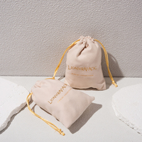 Lionwrapack échantillon gratuit OEM personnalisé Oem Logo enveloppe forme sac luxe en daim rabat bijoux pochette cosmétique sac