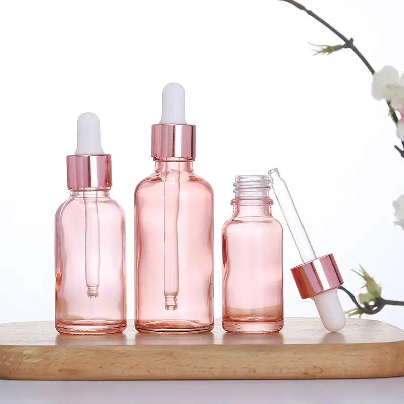 Vendita calda 30ml 1OZ bottiglie di olio essenziale bottiglia di olio per il corpo dei capelli liquidi flacone contagocce in vetro rosa con coperchio in oro rosa