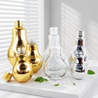 Bouteille en verre en forme d'ampoule avec logo personnalisé, pot en verre unique en forme d'ampoule vide avec bouchon à vis pour emballage cadeau de boissons et spiritueux