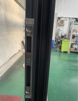 Porte pivotante de sécurité extérieure en aluminium Porte pivotante d'entrée moderne en aluminium noir avec système de verrouillage allemand Hoppe