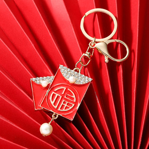 ซองแดงสำหรับเทศกาลปีใหม่ พวงกุญแจ จี้ห้อย พวงกุญแจ<span class=keywords><strong>รถ</strong></span>ยนต์สุดเก๋เพื่อความร่ำรวยอย่างรวดเร็ว และของขวัญชิ้นเล็กๆ - Product Image 1