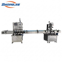 Ligne de remplissage automatique à pompe magnétique Zhongjie 1800-6000BPH pour bouteilles de 200 ml, haute précision et économie d'énergie