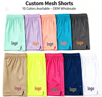Shorts de basketball personnalisés pour hommes en maille respirante Spandex/Polyester avec logo imprimé par transfert thermique sur le devant et cordon de serrage OEM/ODM