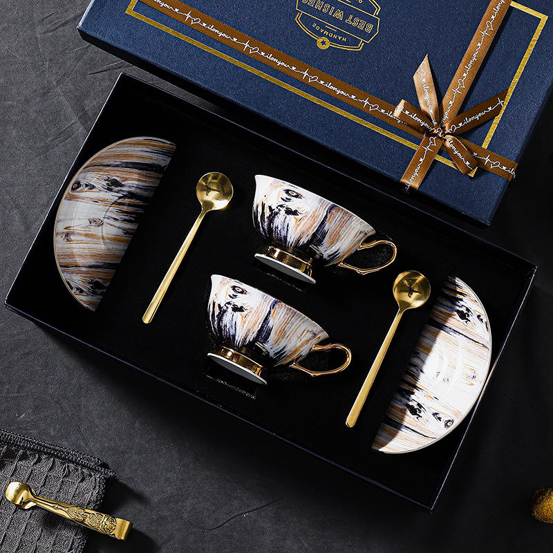 Two cups and saucers spoon exquisite gift box