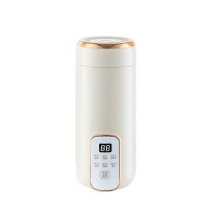 Taza de agua eléctrica portátil inteligente de 600 ml con pantalla digital y calentamiento a temperatura constante para uso en oficina y viajes - Product Image 1