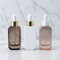 Flacon compte-gouttes plat en verre de luxe 30ml 50ml avec bouchon doré, personnalisable avec logo estampé à chaud, pour diffuseur de parfum et cosmétiques essentiels