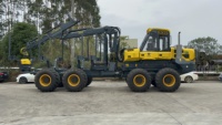 Remorque forestière pour machines de manutention, scie à bois, fendeuse de bûches avec grue hydraulique et tête de récolte à vendre