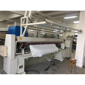 Machine à matelasser informatisée d'occasion pour textiles de maison et literie, pour la confection de couvertures matelassées - Product Image 4