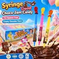 Cokelat Susu Warna-warni Isi Selai Cokelat Cair dalam Kemasan Suntik Kustom Grosir dengan Mainan Balon untuk Anak-anak