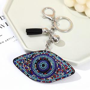 Venta al por mayor de diamantes de imitación ostentosos cristal azul diablo ojo borla colgante llavero clásico mágico pavo brillo mal de ojos encanto llavero - Product Image 4