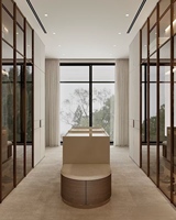 Dressing intégré sur mesure pour toute la maison avec îlot central et porte miroir coulissante