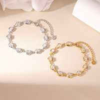 Bracelet en acier inoxydable avec pierres CZ scintillantes, style européen luxueux et tendance, bijoux pour femmes, idéal pour les fêtes et les cadeaux.
