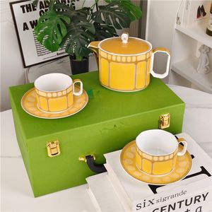 Service à thé en porcelaine jaune de luxe européenne, écologique, avec tasse à café et soucoupe, pour un usage domestique et des cadeaux de mariage - Product Image 1