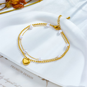 Chaîne de cheville double en acier inoxydable doré avec perles irrégulières et breloques cœur gravées, style féerique pour femme, idéale pour l'été à la plage - Product Image 3