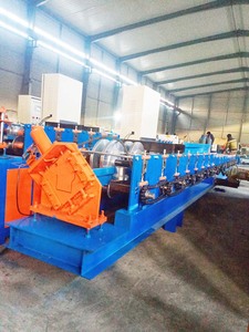 Máquina perfiladora de borde de goteo a precio de fábrica, máquina eléctrica para formar rieles, perfiladora de rodillos para paneles galvanizados y filtros de drenaje - Product Image 3