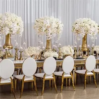 Chaise de banquet d'hôtel, événementielle ou de mariage en acier inoxydable, dossier rond en cuir PU et velours, design empilable, couleur or, vente chaude