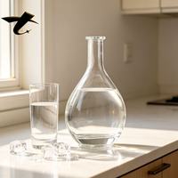 Meilleure bouteille en verre 700ml 750ml en verre flint, forme goutte, col court, pour whisky, avec poignée artistique, bouchon en liège, bouteille vide pour spiritueux