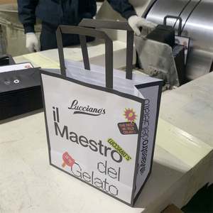 Sacs en papier kraft imprimés de luxe en gros KM, avec poignée, recyclables, pour la vente au détail, logo de marque de vêtements, sacs d'emballage personnalisés pour les achats - Product Image 2