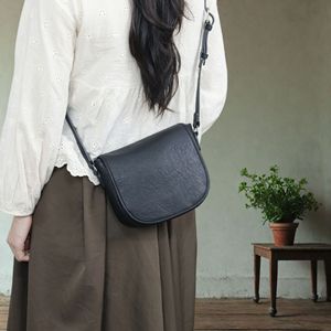 Nasman Women's Genuine Leather Saddle <b>Bag</b> Oval Vintage Crossbody Shoulder <b>Bag</b> Coffee Brown And Black All Seasons Casual Style - Product Image 1