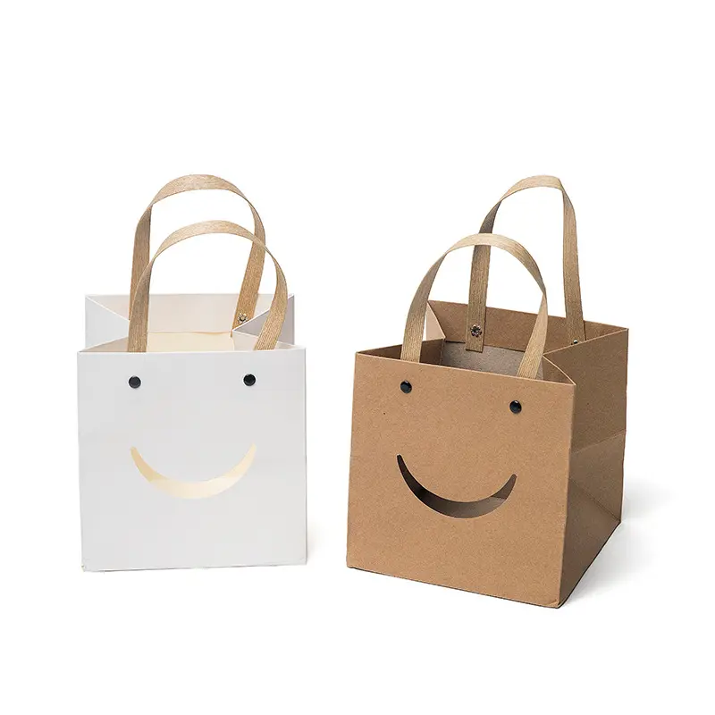 Vente en gros Sacs d'emballage cadeau personnalisé souriant visage carré fond marron blanc kraft artisanat papier avec poignée plate