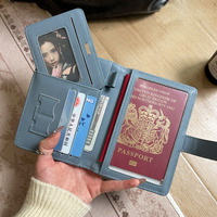 Porte-passeport vintage en cuir PU avec blocage RFID, fermeture à bouton et étui de protection, étui portable pour cartes et organiseur de documents