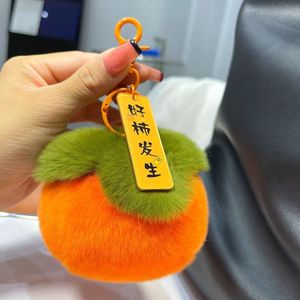 Llavero colgante para coche con pompón de piel sintética de conejo rex, diseño de pequeña caqui y la frase 'good things happen', disponible en stock - bonito colgante de peluche para bolso - Product Image 1