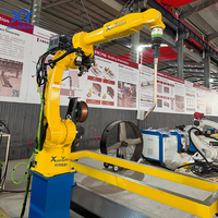 Station de travail robotisée de soudage à double position industrielle, cellule de soudage robotisée pour la soudure de pièces automobiles, de matériel et de métaux