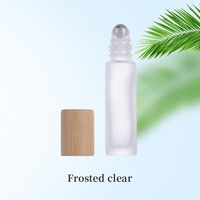 Vente en gros de flacons en verre transparent givré brun vides pour huiles essentielles et parfums, 5 ml, 10 ml, 15 ml, avec bouchon en bambou et bille en métal