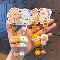 Hot verkopende schattige cartoonhond sleutelhanger in koppelstijl van hars, met schattig huisdierfiguurtje als dagelijks accessoire voor dierenliefhebbers.