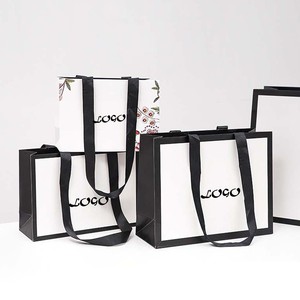 Perruques <span class=keywords><strong>de</strong></span> petits cils <span class=keywords><strong>de</strong></span> luxe personnalisés rouge à lèvres noir mat sacs cadeaux en <span class=keywords><strong>papier</strong></span> brun avec poignées <span class=keywords><strong>de</strong></span> ruban gros-grain - Product Image 4