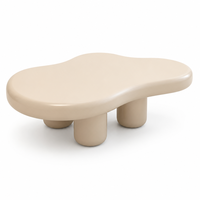 Table basse en forme de nuage arrondie avec un profil bas et une base cylindrique pour la maison, l'hôtel, le salon et la zone de réception