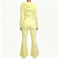 Ensemble de survêtement zippé surdimensionné pour femme avec patch brodé côtelé personnalisé de haute qualité et pantalon évasé – Tenue d'intérieur hivernale
