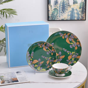 Service de table 4 pièces en porcelaine fine avec bols, assiettes, tasses et soucoupes – Motif porte-bonheur et joyeux pour usage familial et cadeaux d'affaires - Product Image 4