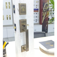 Cerraduras y llaves de puerta antiguas de estilo europeo populares, manijas de cerradura de puerta delantera doradas de latón moleteado de lujo