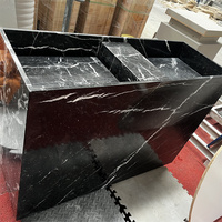 Meuble-lavabo flottant en marbre Nero Marquina avec tiroir, lavabo en pierre naturelle, design moderne et luxueux