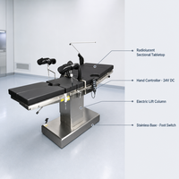 Table d'opération électrique à trois fonctions avec surface radiolucente, hauteur 650-950 mm, 180 kg