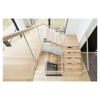 Escalier à monopoutre de style industriel, finition acier noir, marches en métal perforé, escalier intérieur commercial pour loft