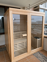 Promotion : Sauna finlandais traditionnel 4 personnes en bois de pruche, avec bancs doubles et chauffage électrique