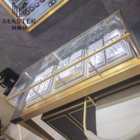 Vitrine de présentation en verre trempé MASTER 150*55*105cm avec éclairage LED, comptoir de présentation de bijoux de luxe en or avec serrure et dessus blanc
