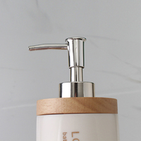 Distributeur de savon en résine personnalisé OEM, design moderne en polyrésine noire, bouteille de savon liquide faite à la main, fabricant pour hôtels et salles de bain