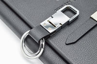 Ensemble cadeau exécutif personnalisé avec logo, carnet en cuir noir de luxe, stylo, porte-clés, porte-cartes de visite