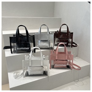 <span class=keywords><strong>Sac</strong></span> à bandoulière grande capacité en PVC pour femme, avec lettres décoratives, fermeture éclair étanche, idéal pour les loisirs, les voyages et le shopping - Product Image 1