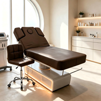 Table de massage électrique moderne et confortable en cuir à 3 moteurs pour salon de beauté, lit de spa facial et de cils réglable avec éclairage