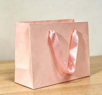 Sacs de courses élégants rose clair biodégradables et durables avec poignées en ruban assorties, vente en gros pour boutiques et cadeaux