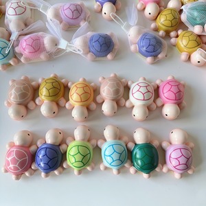 Juguete antiestrés de tortuga pequeña de rebote lento con bolsa de malla, ideal para fiestas, juguete pop para aliviar el estrés - Product Image 1