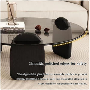 סט של 2 שולחנות קפה עגולים עם משטח זכוכית בצבע ענבר ובסיס עץ שחור לסלון - Product Image 3