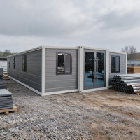 Maison conteneur extensible en acier renforcé, résistante aux intempéries, avec des murs épaissis pour une vie sécurisée dans les zones à fort vent